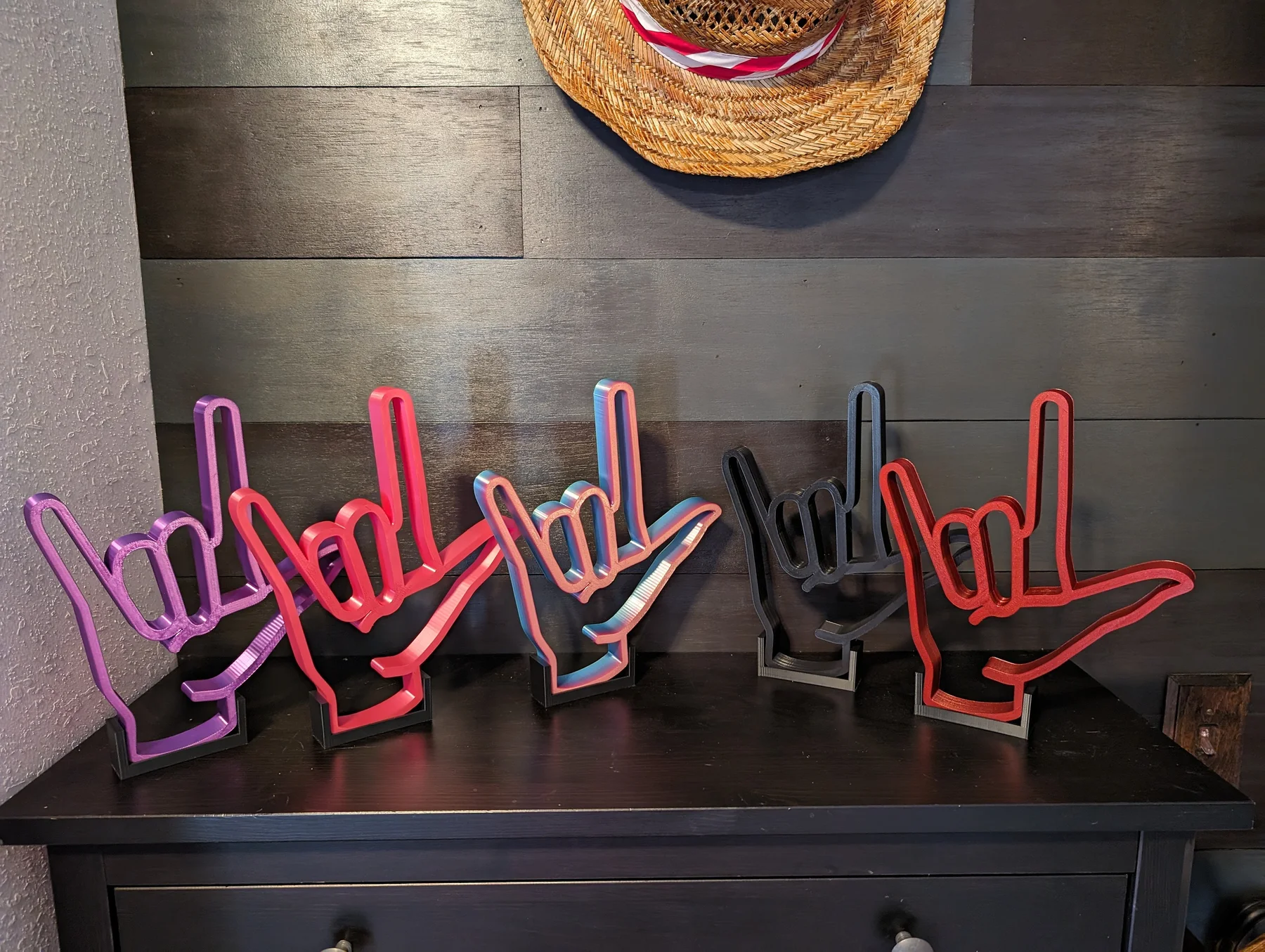 ASL I Love You sign with stand on display