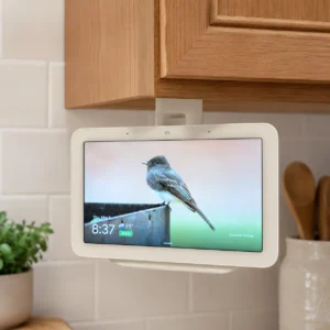 Google Nest Hub 2nd Gen installed in a white under-cabinet swivel mount